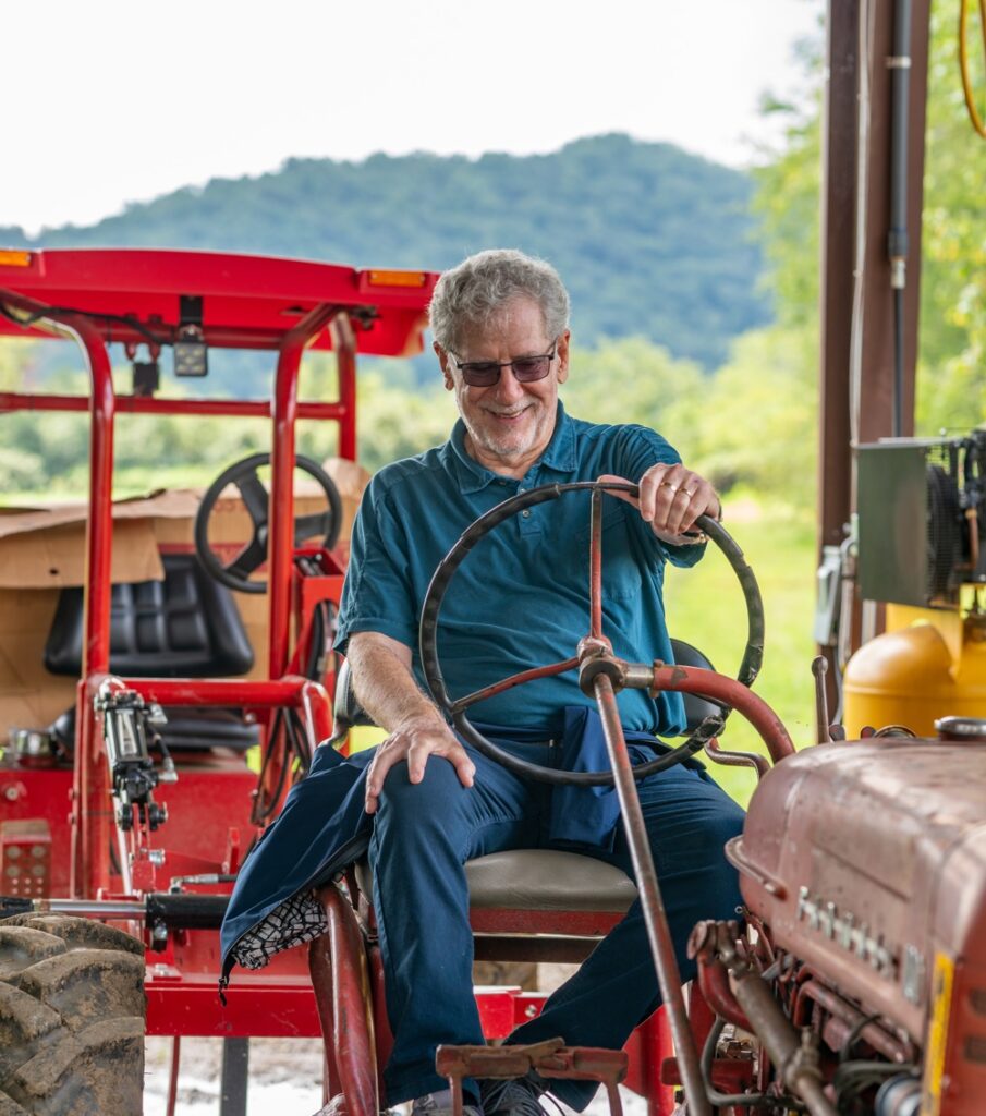 Joe appreciates an old Farmall tractor