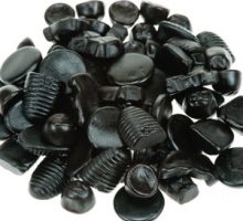 assorted black licorice drops and candies--too much could lead to licorice side effects
