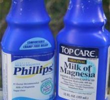 two bottles of Milk of Magnesia (MoM) laxative