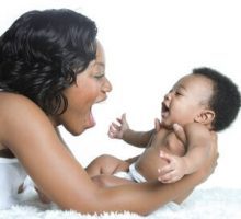 happy african american mother and baby