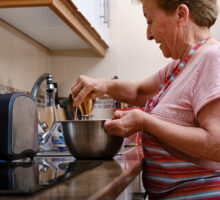 woman mixing up a wacky arthritis remedy in her kitchen