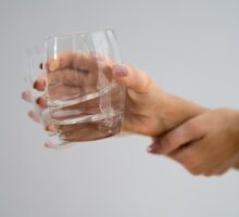 Woman with hand tremors