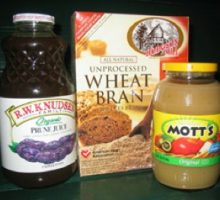 The ingredients for Power Pudding for constipation: prune juice, apple sauce and wheat bran.