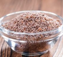 Bowl of psyllium husks, an excellent source of dietary fiber, to help you get off a PPI