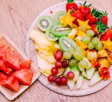 fruit platter with watermelon, grapes, kiwi, pineapple, honeydew, starfruit, strawberries could make your throat itch if you have OAS