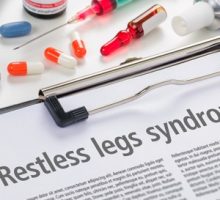 The diagnosis Restless legs syndrome written on a clipboard