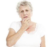 a confused or forgetful older senior woman