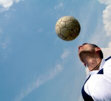 soccer player heading the ball
