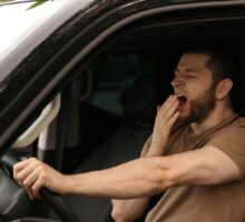 man driving while tired and impaired