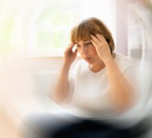 woman experiencing vertigo from BPPV