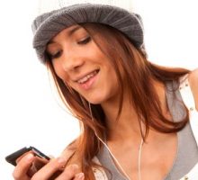 woman dressed for athletics checks cell phone
