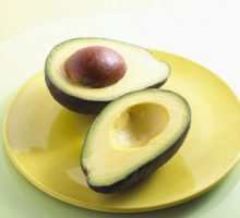 A cut avocado high in monounsaturated fat