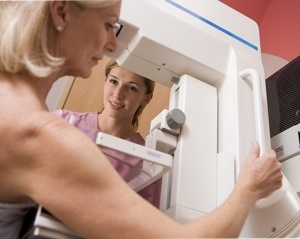 woman getting a mammogram