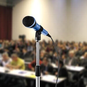 a microphone in front of an auditorium