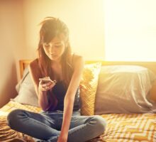 teenager getting screen time at bedtime