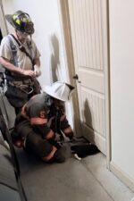 Tight squeeze? Firefighters rescue cat trapped under door Tight squeeze? Firefighters rescue cat trapped under door