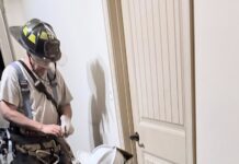 Tight squeeze? Firefighters rescue cat trapped under door