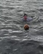 Boston man almost lost his own life diving into freezing water to rescue his dog