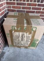 ‘Scared eyes’ looked up from sealed taped-up box in left in freezing morning at shelter door