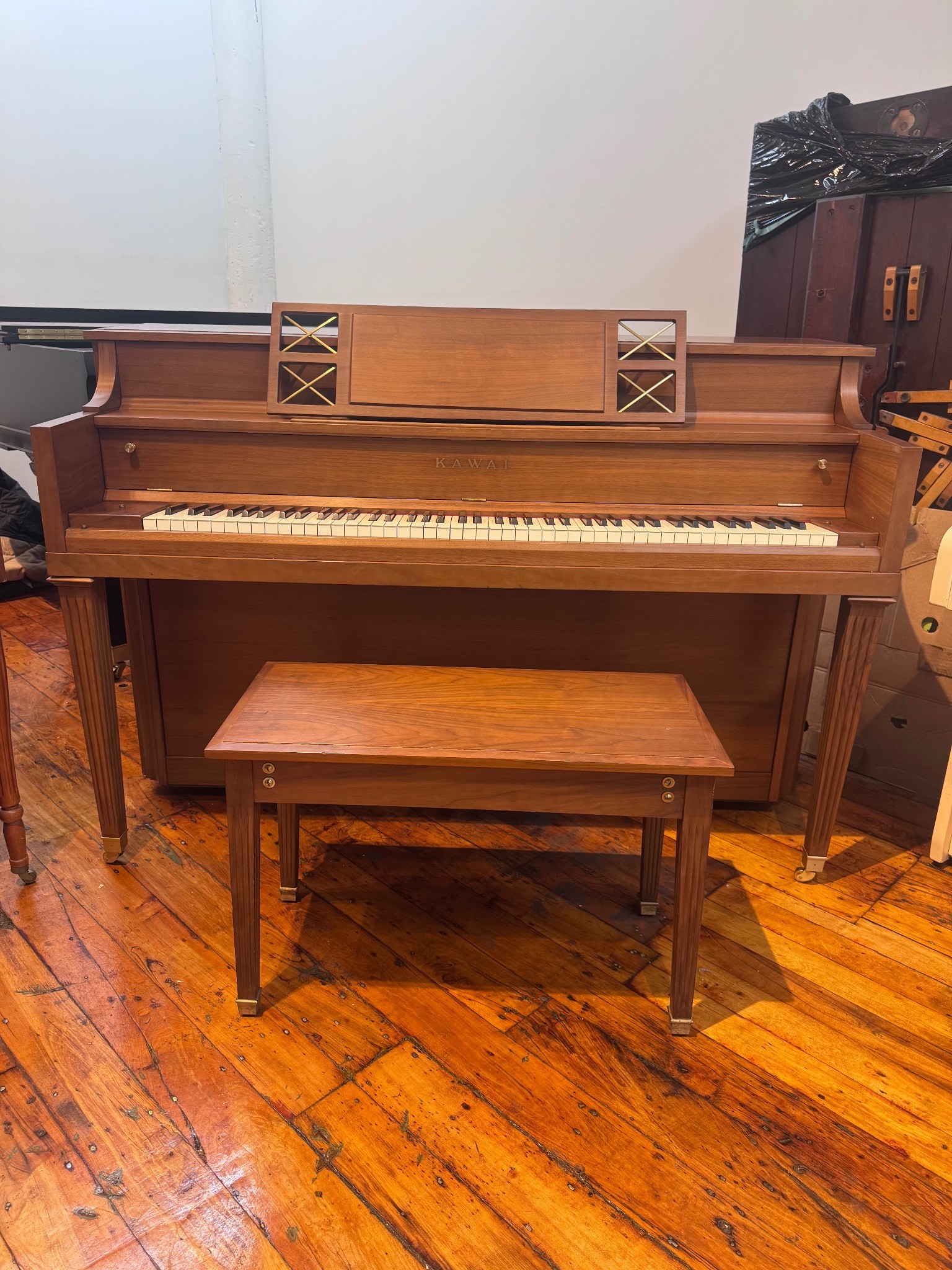 Kawai upright piano prepared by a piano shop