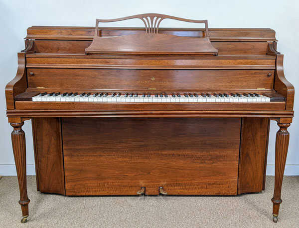 1981 Steinway 42" walnut console