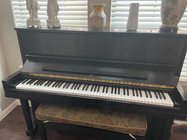 Steinway ebony upright piano