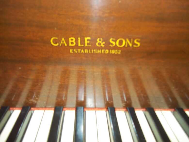 Cable and Sons baby grand piano