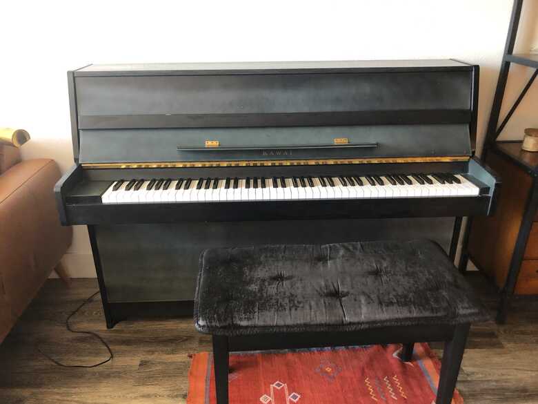 Upright Kawai in excellent condition for immediate purchase