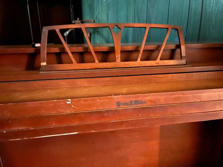 Fairly old upright (spinnet type) Henry F. Miller piano