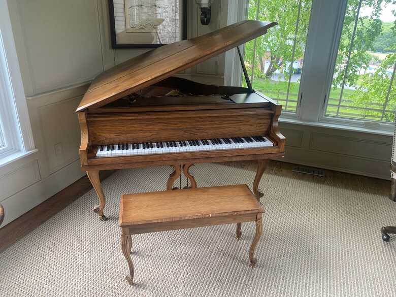Beautiful Baby Grand Piano in Oak finish