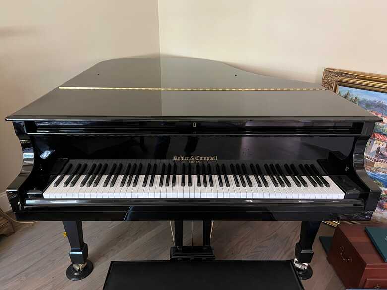Immaculate and stately Grand Piano that will sound beautiful