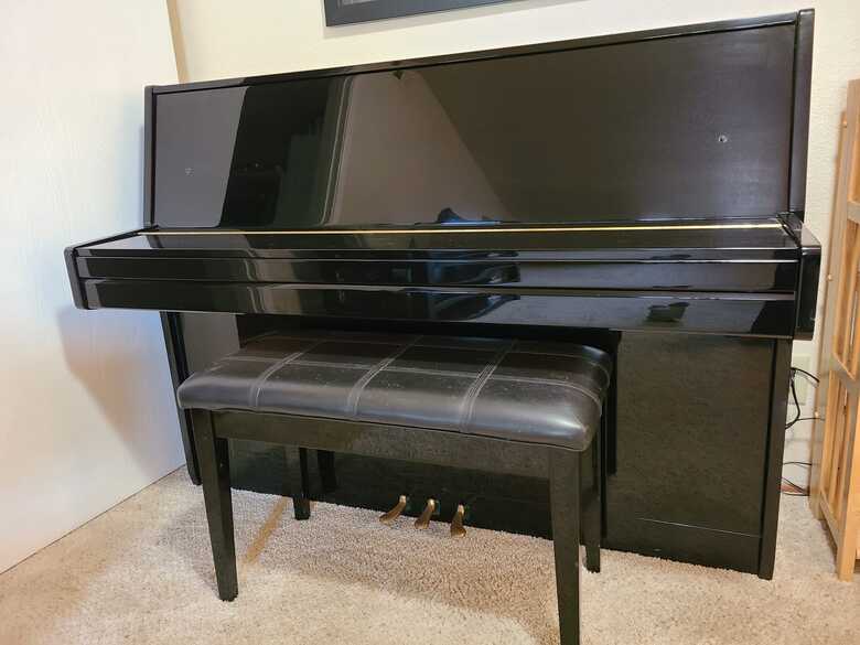 2001 Wurlitzer Upright Piano with bench for sale