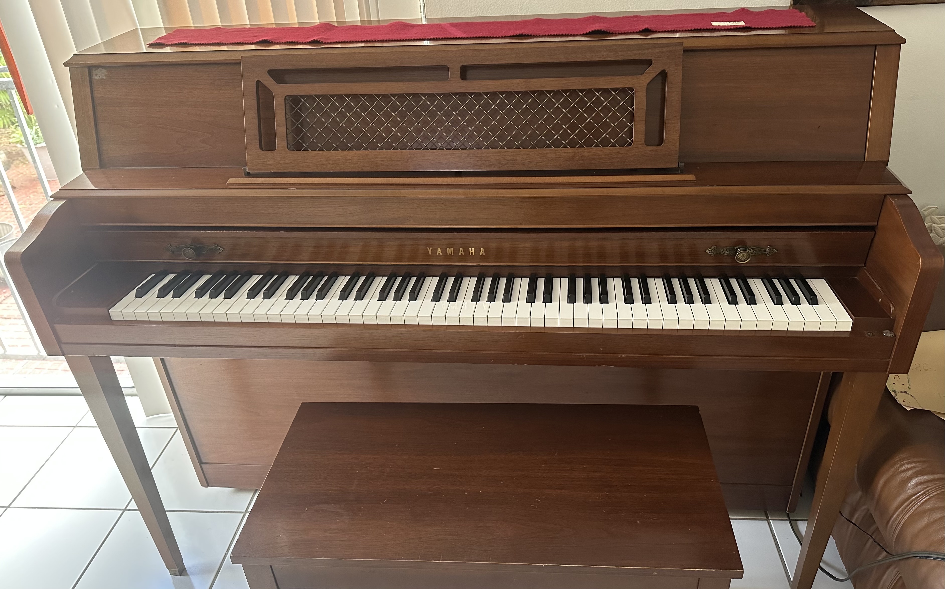 Yamaha M304 upright piano in walnut satin finish