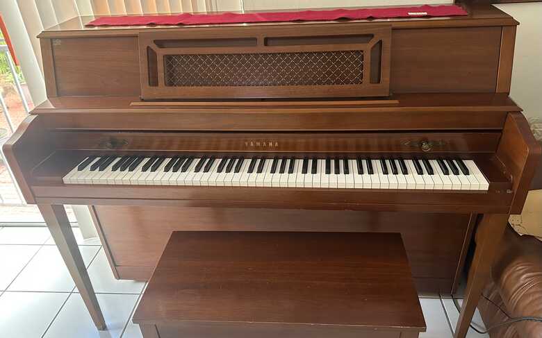 Yamaha M304 upright piano in walnut satin finish
