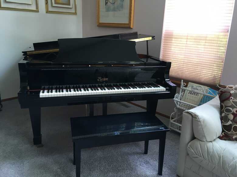 Beautiful Ebony Grand Piano in Pristine Condition!