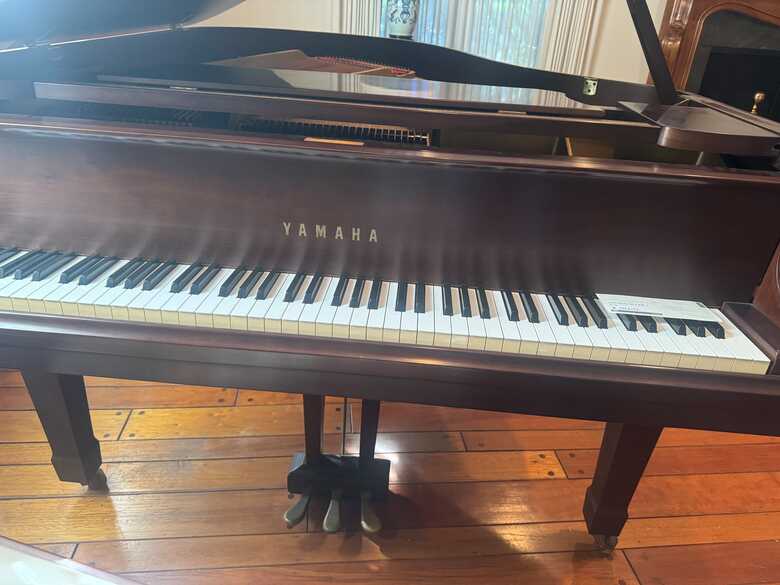 Beautiful mahogany grand piano 