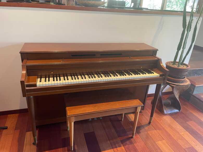 1959 Upright Kimball with bench.