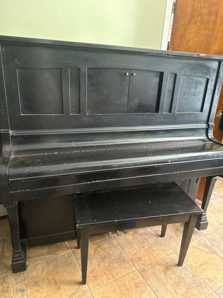 Player piano with rolls 