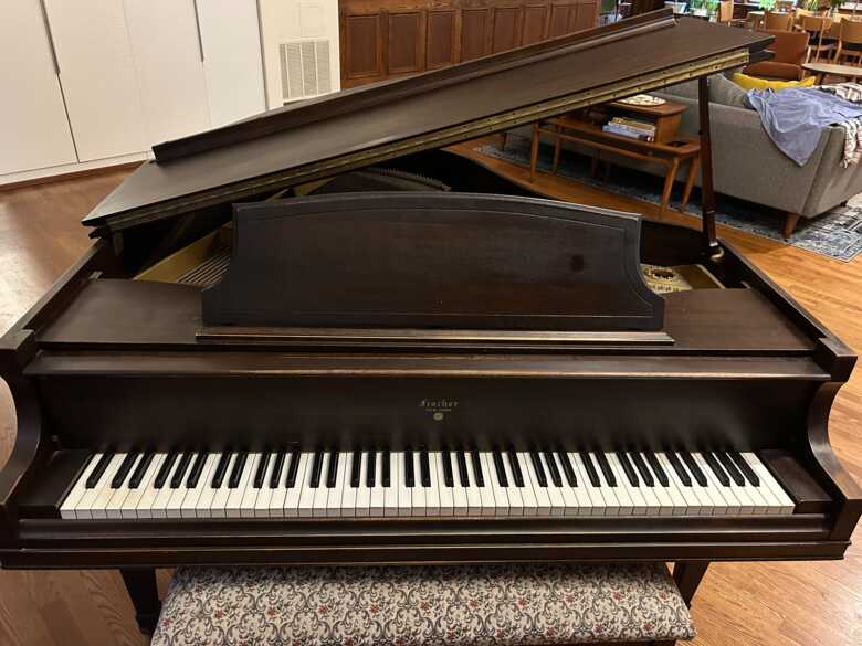 Classic parlor baby grand, plays great