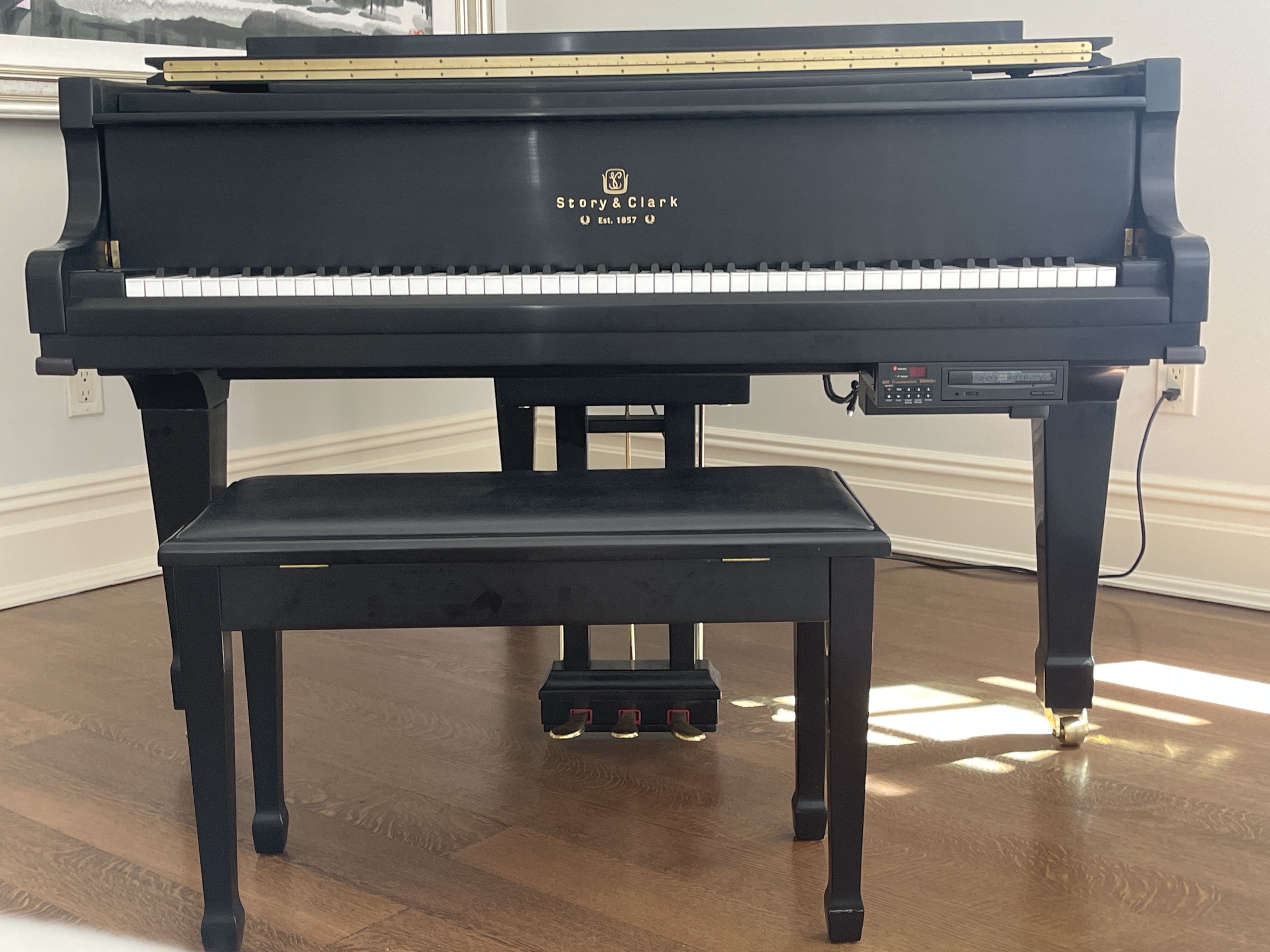 Story & Clark baby grand piano