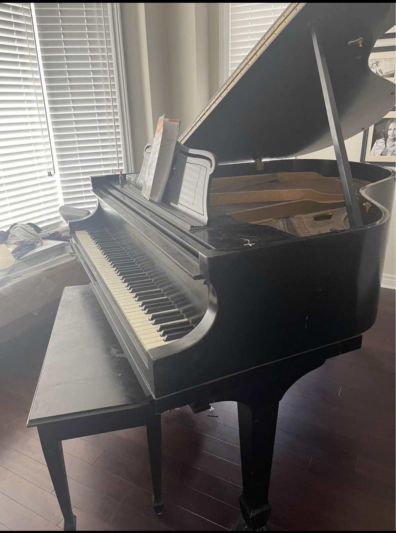 This is an antique mason & risch piano