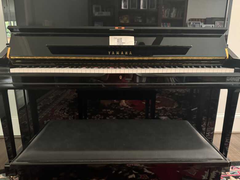 Almost new Yamaha upright piano