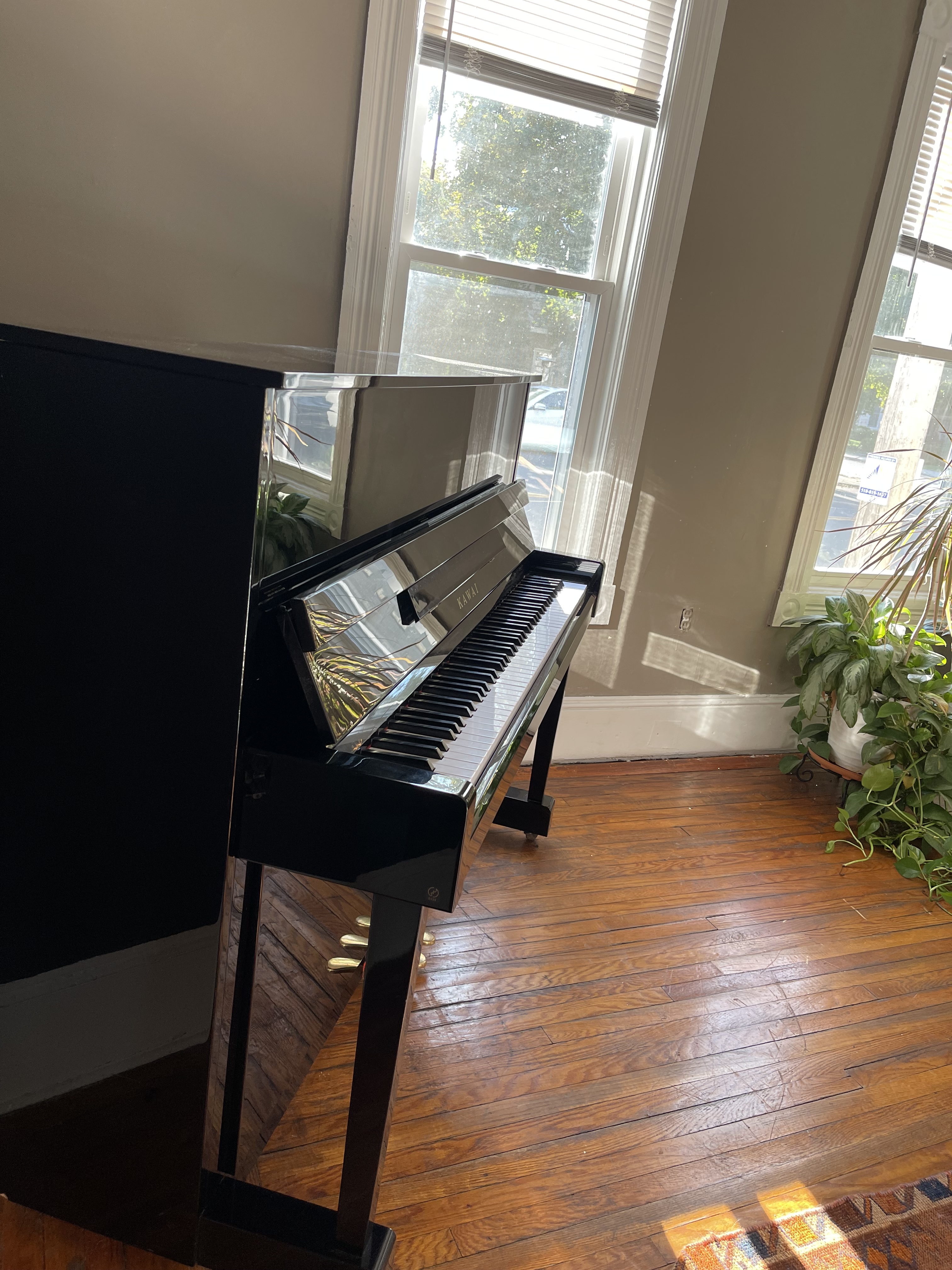 Ebony Upright Kawai Piano