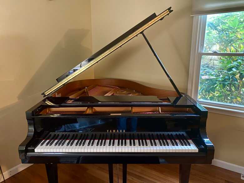 Yamaha Baby Grand C1 with bench, like new.