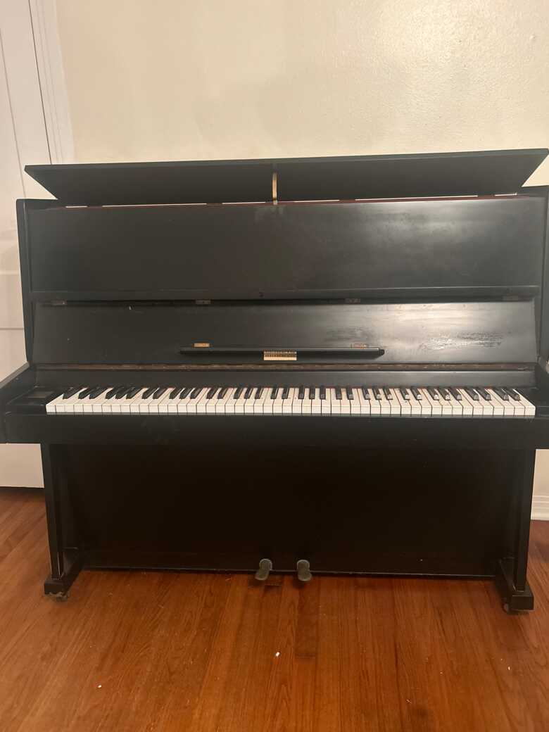 Steinberg piano with angled legs 