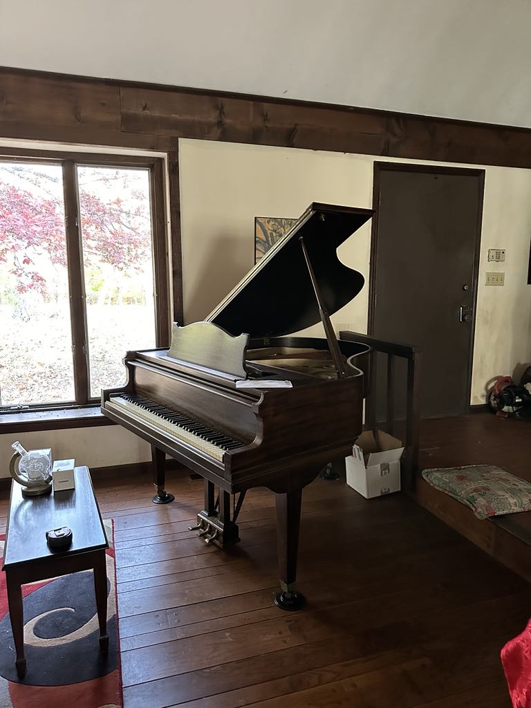 A beautiful 1930 Acrosonic baby grand piano