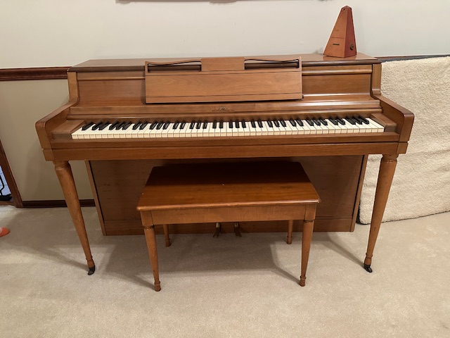 Good quality piano and bench