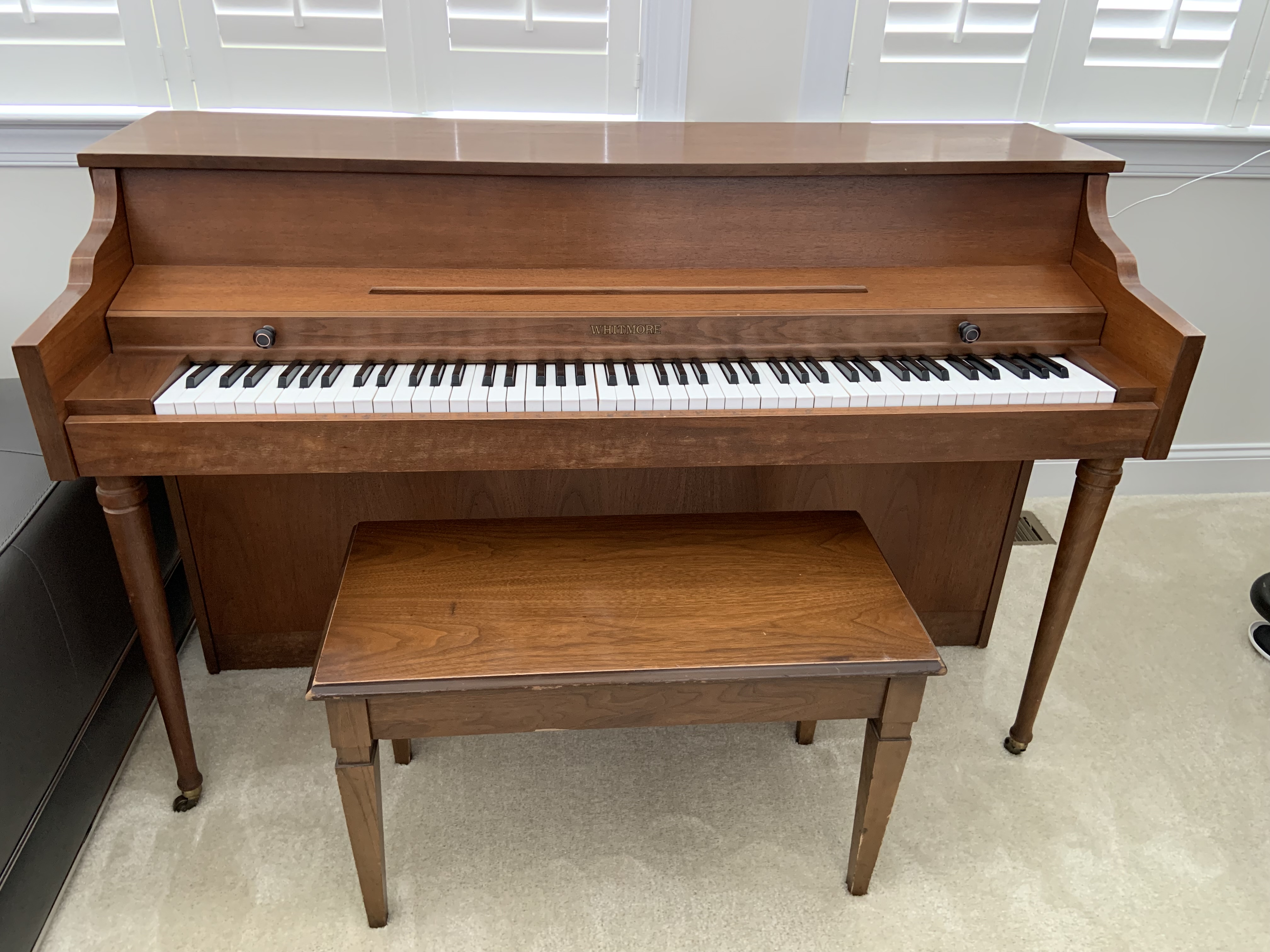 Beautiful upright piano manufactured by Kimball