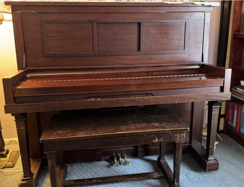 AB Chase upright with bench in same family since 1915