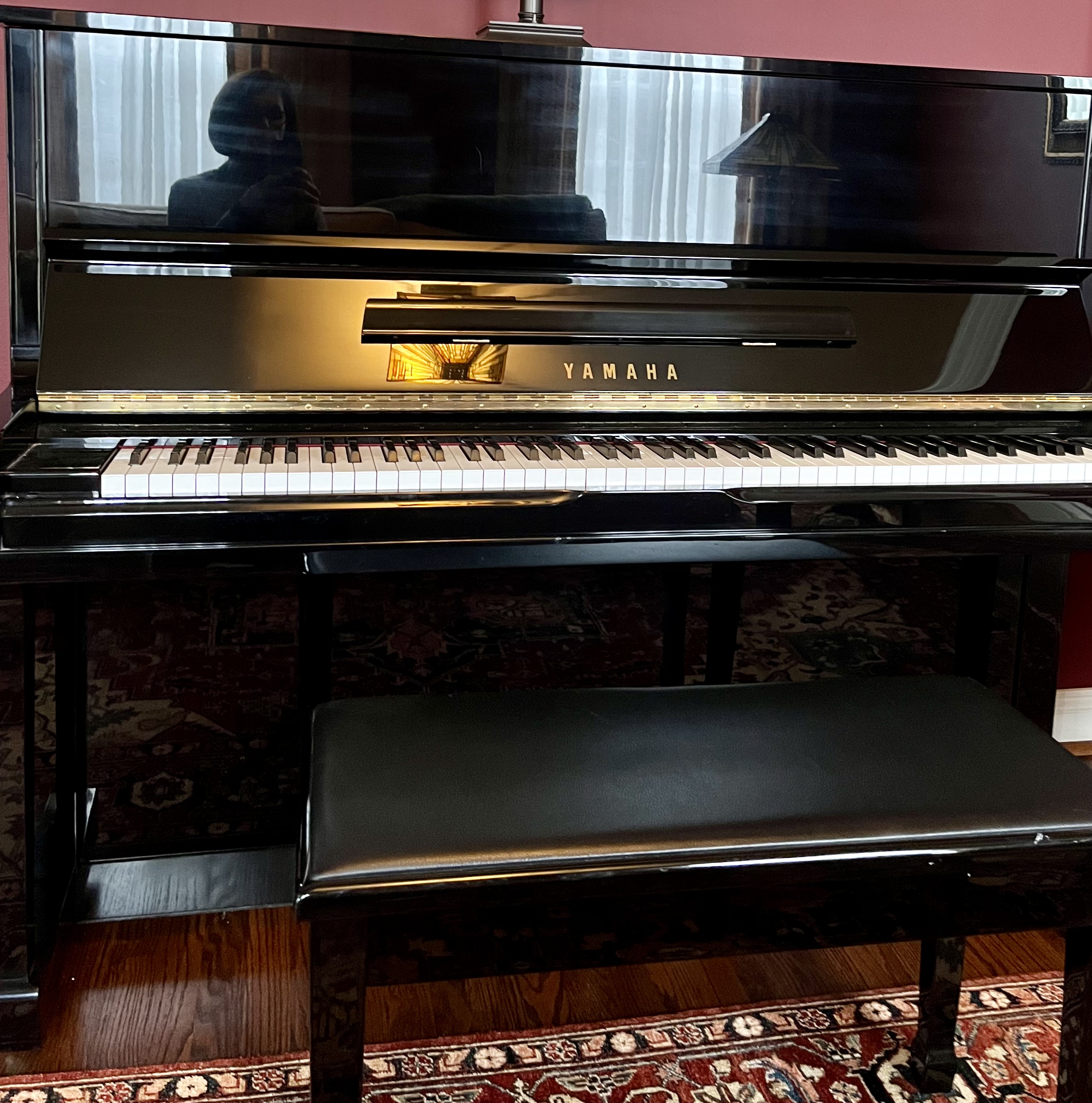 Beautiful upright piano with bench